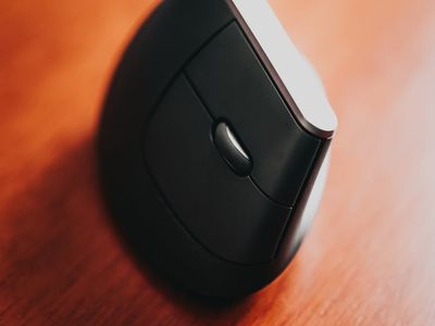 Minimalist wooden desk with smooth natural objects for focus